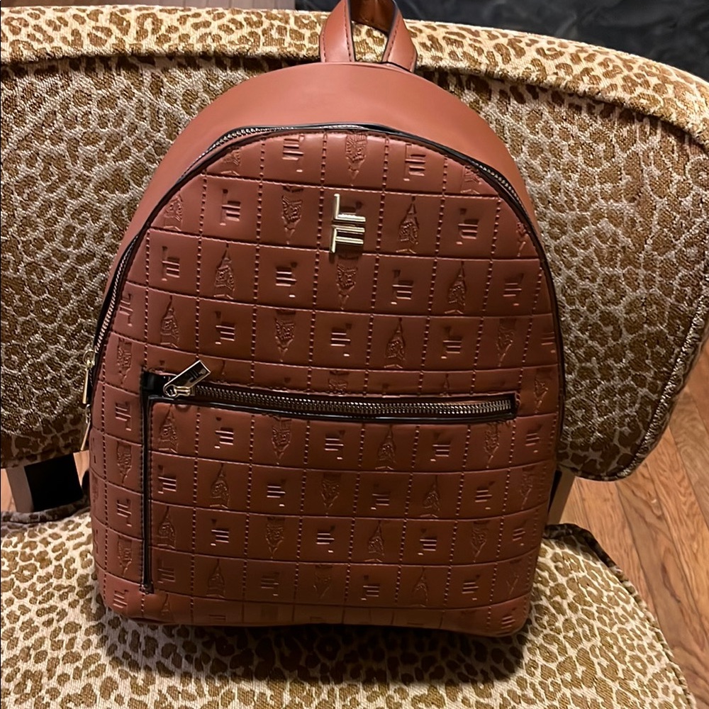 London Fog Tan Backpack with Sleek Design